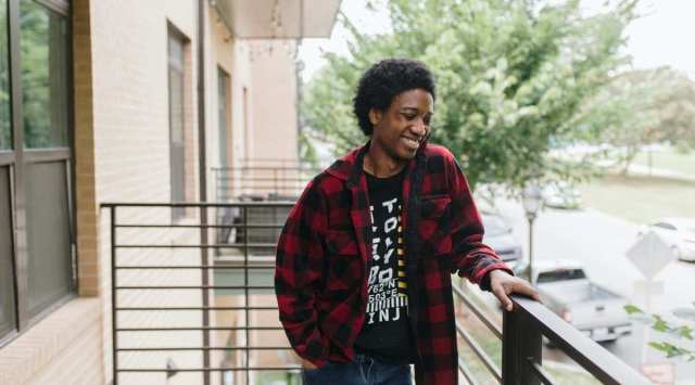 Mark Wray, 25, at his new home in Charlotte, NC, July 31, 2021. When Wray lost his job last year working concessions at a movie theater, he got training for higher-paying work. (Alycee Byrd/The New York Times)