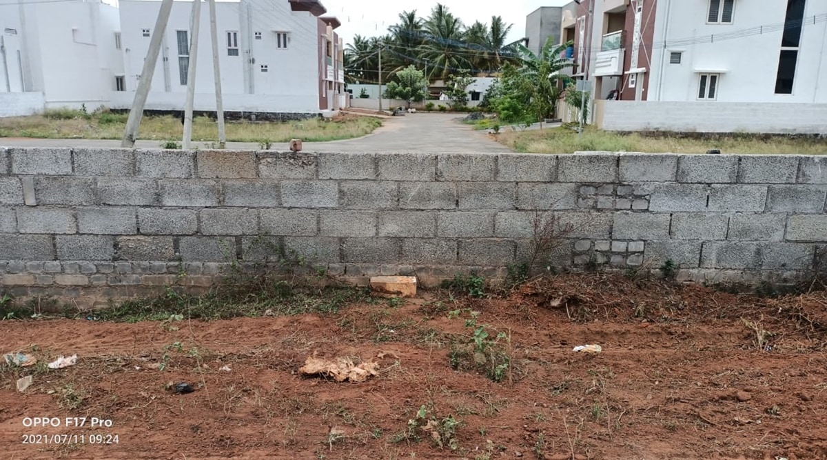 forced to take a detour from the Pannimadai main road to reach their houses after a realtor built a gated community | Express photo