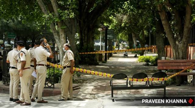 Police at the spot where a women and man allegedly set each other on fire in front of the Supreme Court in New Delhi on August 16. (Express photo by Praveen Khanna)