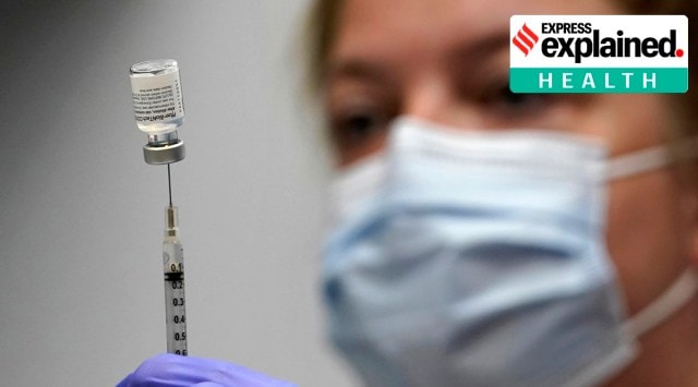 Pharmacy technician loads a syringe with Pfizer's Covid-19 vaccine at the Portland Expo in Portland, Maine. (AP/File)