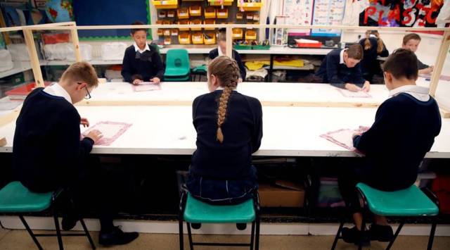 England gets ready for mass COVID inoculations for 12- to 15-year-olds