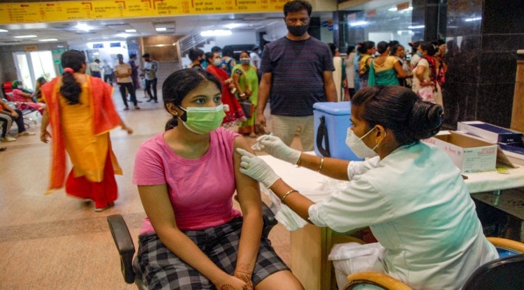 Noida: A beneficiary receives COVID-19 vaccine dose, at a district hospital in Noida, Saturday, Aug 28, 2021. (PTI Photo)