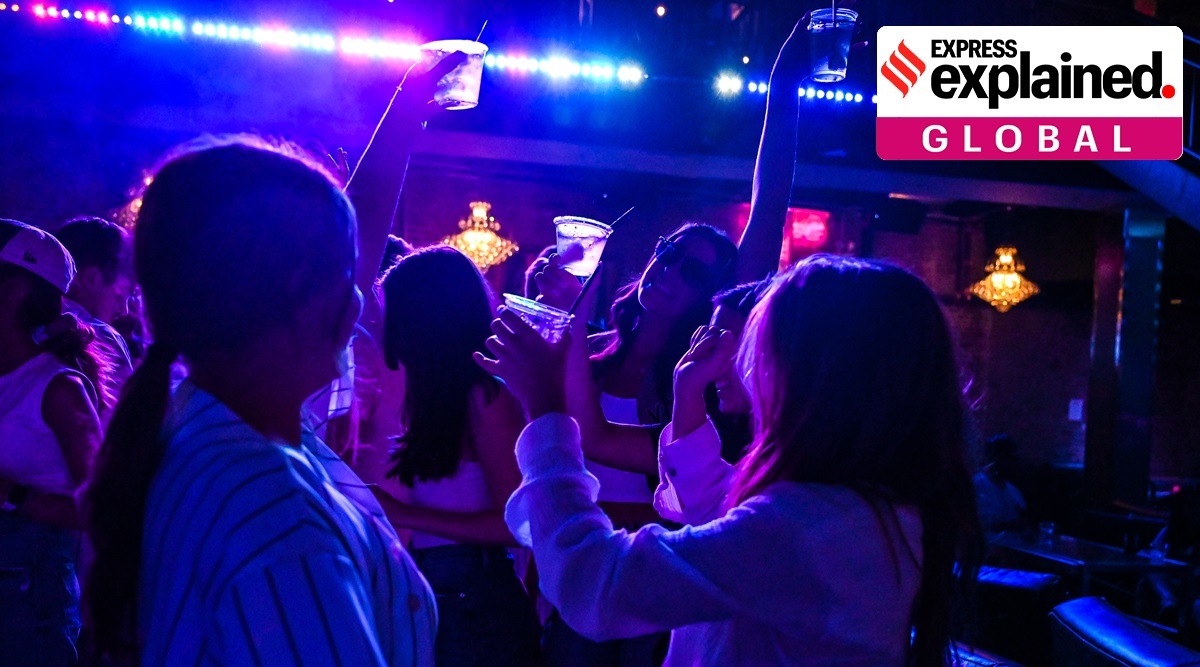 Patrons dance at a bar in New York, June 18, 2021. Unvaccinated patients in hospital intensive care units are younger than those at the outset of the pandemic, doctors say. (Desiree Rios/The New York Times)