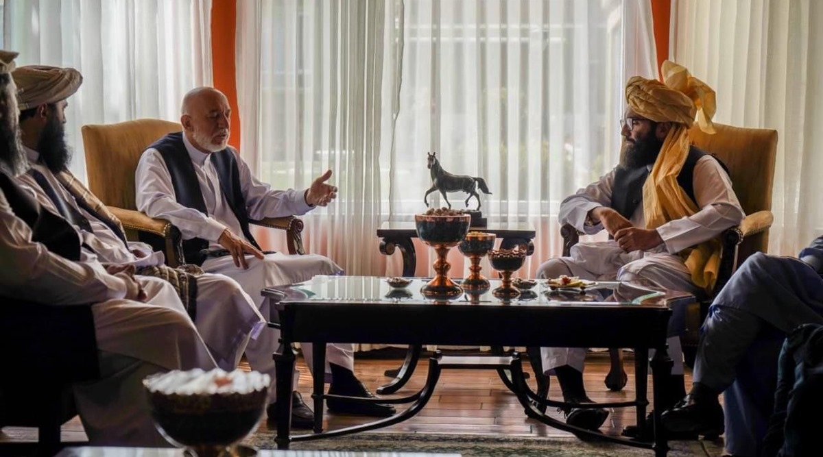 hamid karzai meets taliban commander in kabul