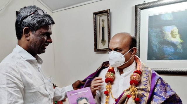 Kota Shrinivas Poojary with Chief Minister Basavaraj S Bommai.
(Twitter/Kota Srinivas Poojari)