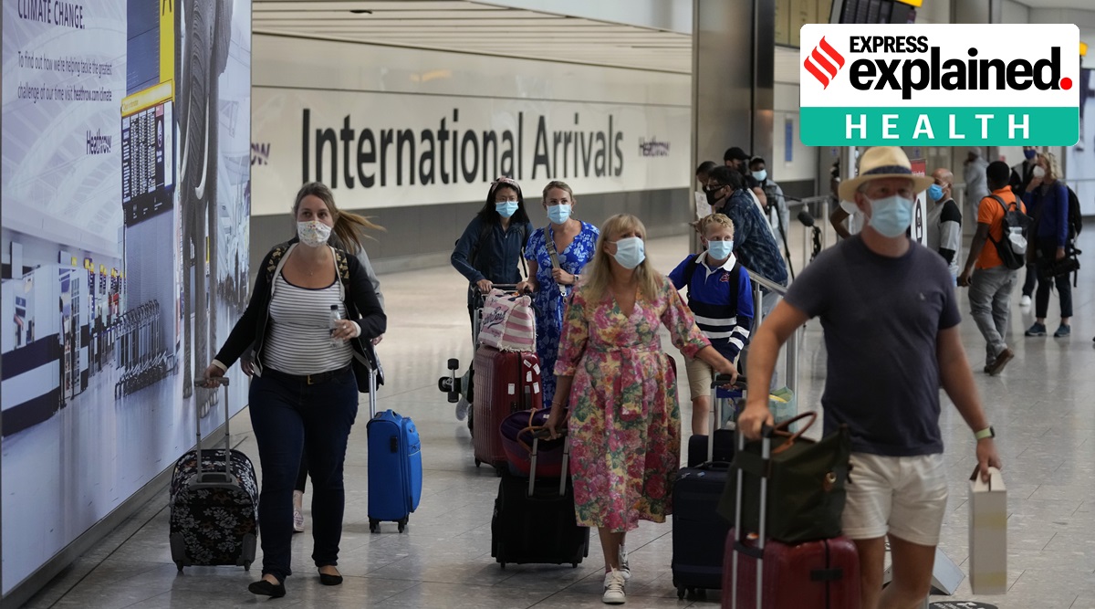 Passengers arrive at Terminal 5 of Heathrow Airport in London, Monday, Aug. 2, 2021. (AP Photo/Matt Dunham)