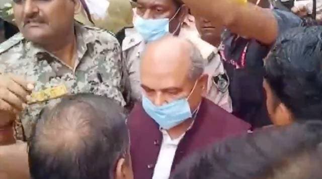 When Tomar visited Karatia Bazaar in the city to meet flood-victims, people jeered at him and were heard saying that he had come too late. (Photo: Videograb/ ANI)