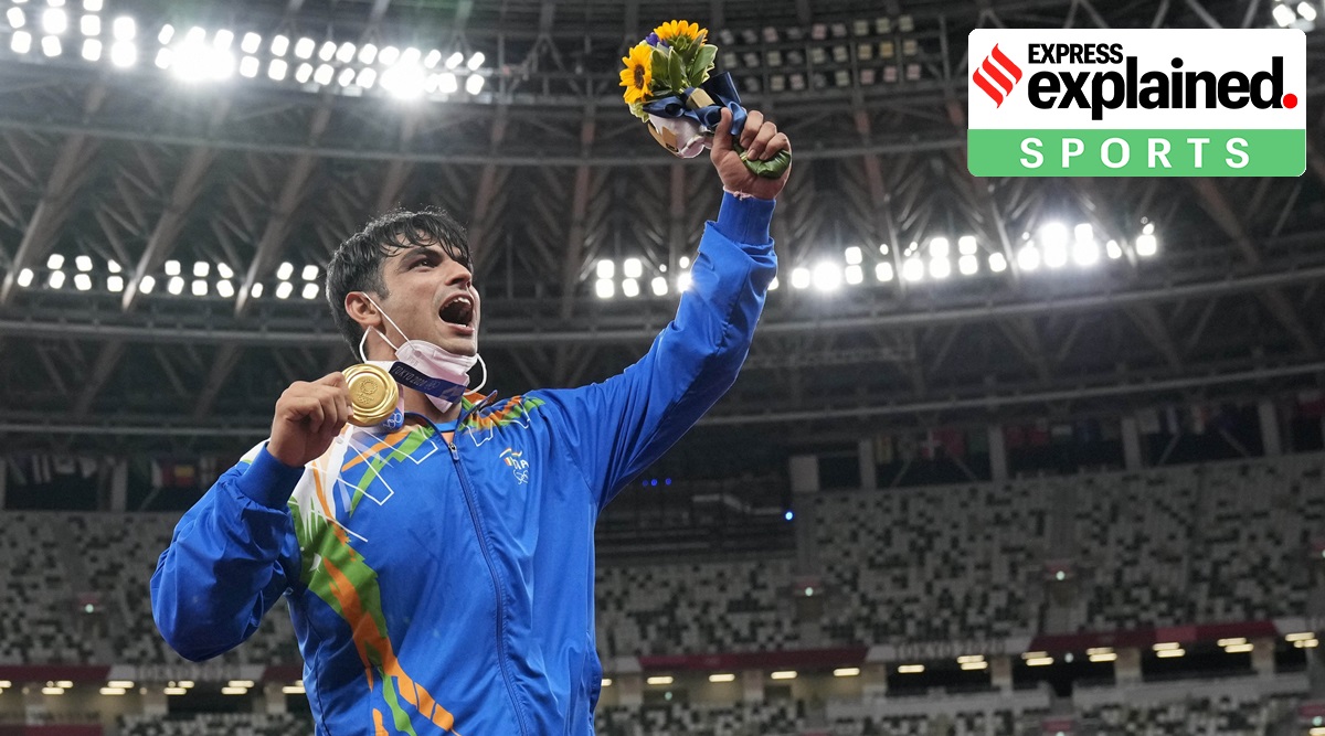 Gold medalist Neeraj Chopra poses during the medal ceremony for the men's javelin throw at the 2020 Summer Olympics, Saturday, Aug. 7, 2021, in Tokyo. (AP/PTI Photo)
