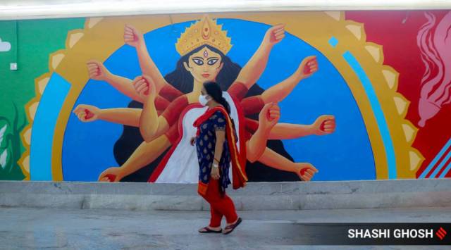 Besides the landmarks, the mural encapsulates the very soul of Kolkata ranging from its food to culture. (Express Photo: Shashi Ghosh)