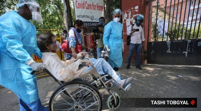 A patient in front of the LNJP Hospital in Delhi (Express file photo by Tashi Tobgyal)