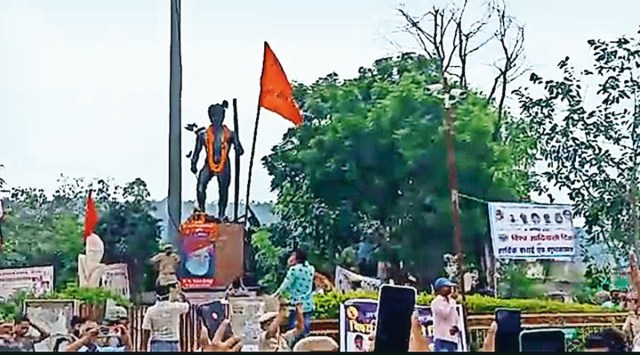Adivasi Mahasabha accuses BJP, RSS of putting up flag. (Express photo)