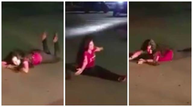 'Drunk' woman lies down on road, blocks traffic; video goes viral ...