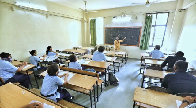 A classroom session for students of class 12 in progress at HBK school, Gurukul as classes resume for 10th and 12th students with restrictions post lockdown on Thursday. Express photo by Nirmal Harindran, 15-07-2021, Ahmedabad *** Local Caption *** A classroom session for students of class 12 in progress at HBK school, Gurukul as classes resume for 10th and 12th students with restrictions post lockdown on Thursday. Express photo by Nirmal Harindran, 15-07-2021, Ahmedabad