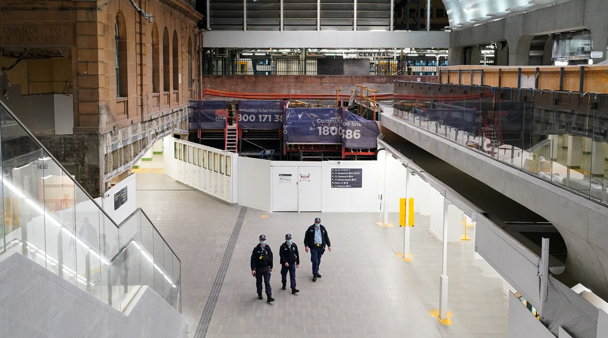 Police officers patrol through the quiet Central Station in the city centre during a lockdown to curb the spread of a coronavirus disease outbreak in Sydney, Australia. (Reuters photo)
