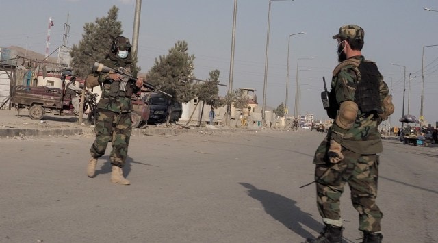 Taliban fighters guard a street leading to the Hamid Karzai International Airport in Kabul, Afghanistan on Aug. 29, 2021. (Reuters)