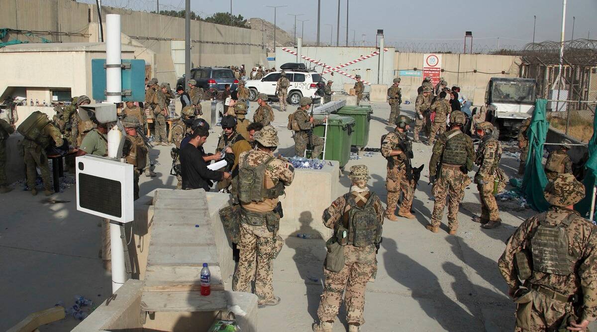 In this photo, members of the British and US military engage in the evacuation of people out of Kabul, Afghanistan. (Ministry of Defence via AP)