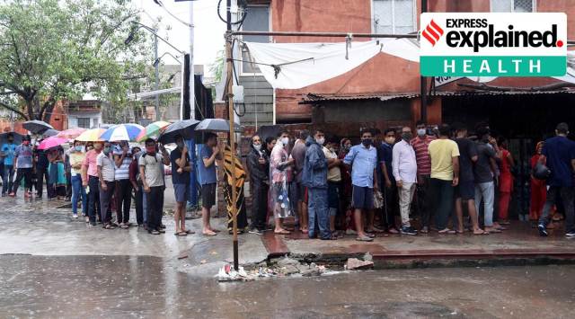 Queue for vaccination in Jaipur last week. India has administered over 50 crore doses, and hopes to procure 135 crore vaccines by December. (Express photo by Rohit Jain Paras)