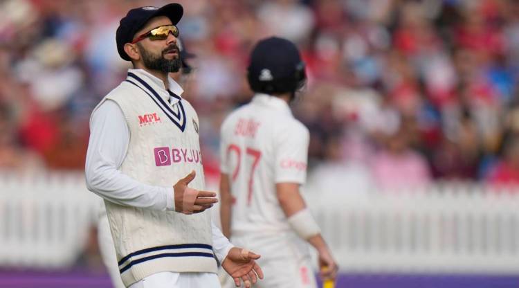 India's Virat Kohli speaks to his bowlers during the second day of the Test. (AP)