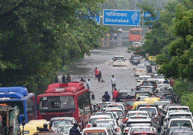 In Photos I Delhi Roads Waterlogged Traffic Hit After Record Rains