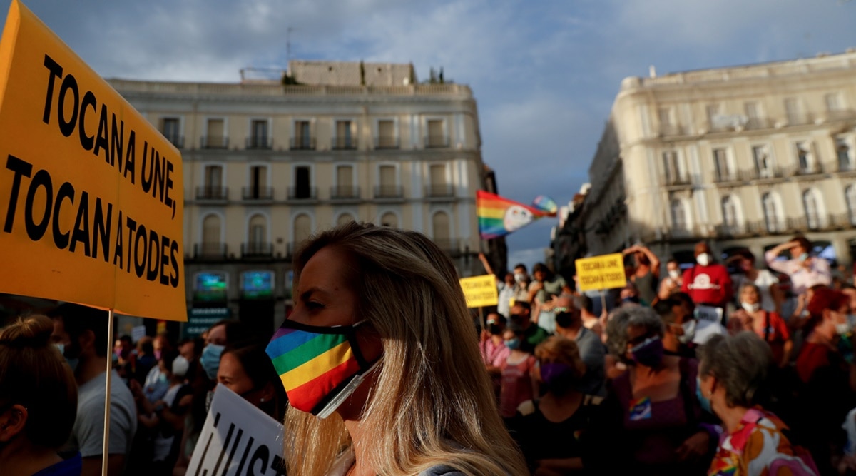LGBTIQ+ activists and supporters demonstrate against hate crimes at Puerta del Sol square in Madrid, Spain, September 11, 2021. (Reuters)