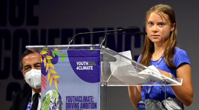 Swedish climate activist Greta Thunberg looks on as she speaks during the Youth4Climate pre-COP26 conference in Milan, Italy, September 28, 2021. (Reuters)