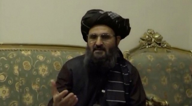 Abdul Ghani Baradar speaks during an interview in Kandahar, Afghanistan, where he denied reports that he was hurt in a clash with a rival faction of the Taliban, in this still image taken from video posted on Sept. 15, 2021. (RTA Kandahar via Taliban via Reuters)
