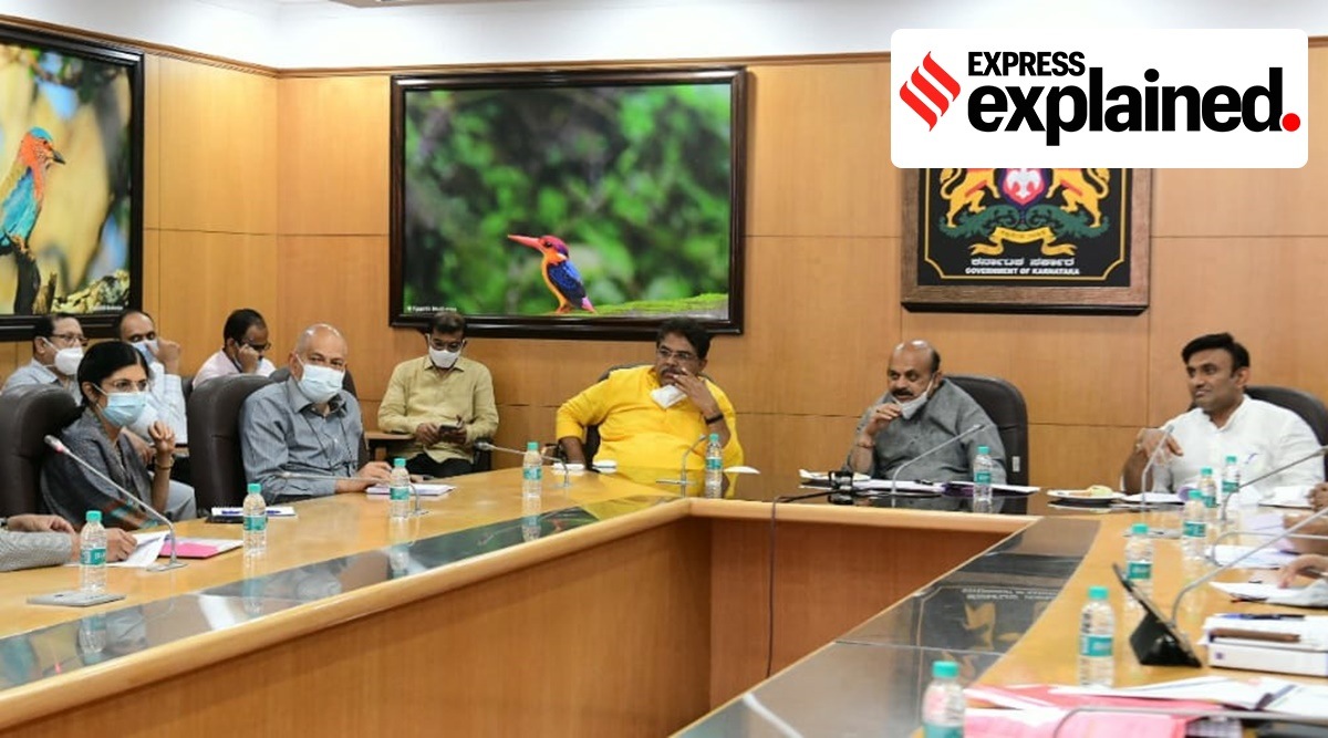 Karnataka CM Basavaraj Bommai with Health and Family Welfare Minister K Sudhakar at a meeting to discuss Covid-19 situation in the state. (Photo: Twitter/@BSBommai)