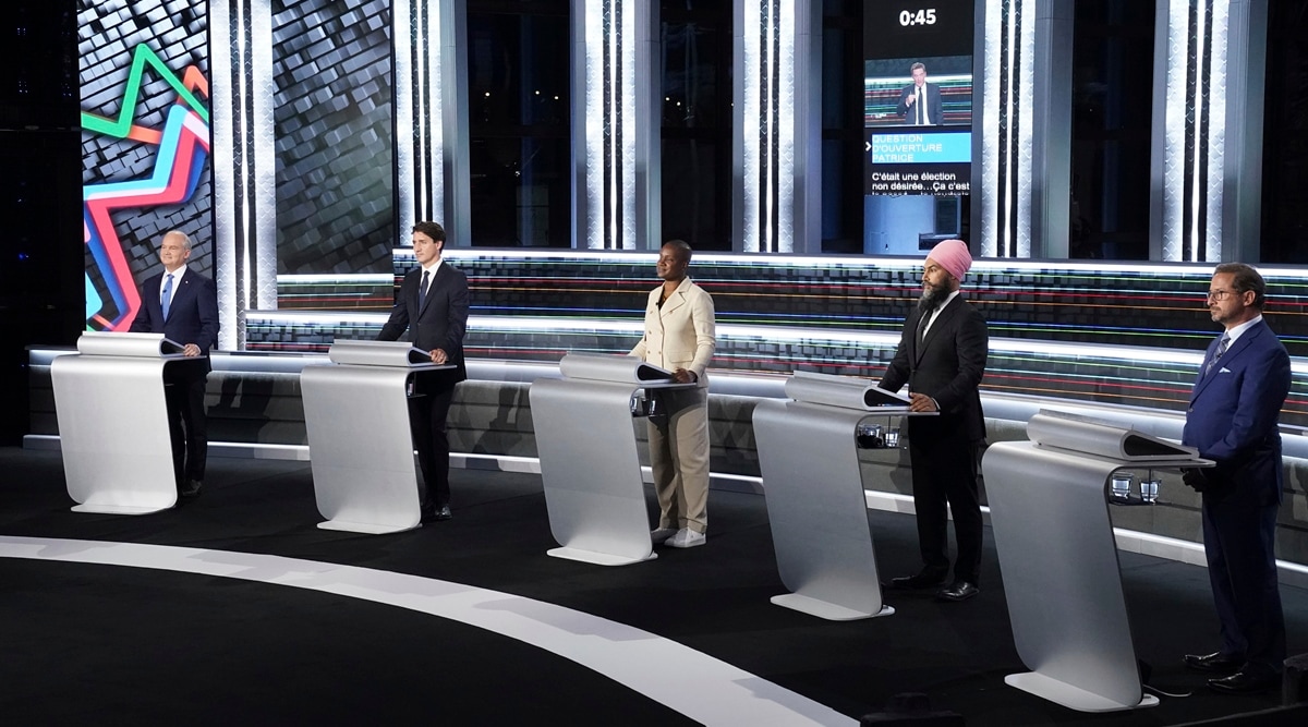 (From left to right) Conservative leader Erin O'Toole, Liberal leader Justin Trudeau, Green leader Annammie Paul, New Democratic Party leader Jagmeet Singh and Bloc leader Yves-Francois Blanchet stand at their podiums before the federal election French-language leaders debate, Wednesday, Sept. 8, 2021, in Gatineau, Quebec. (AP)