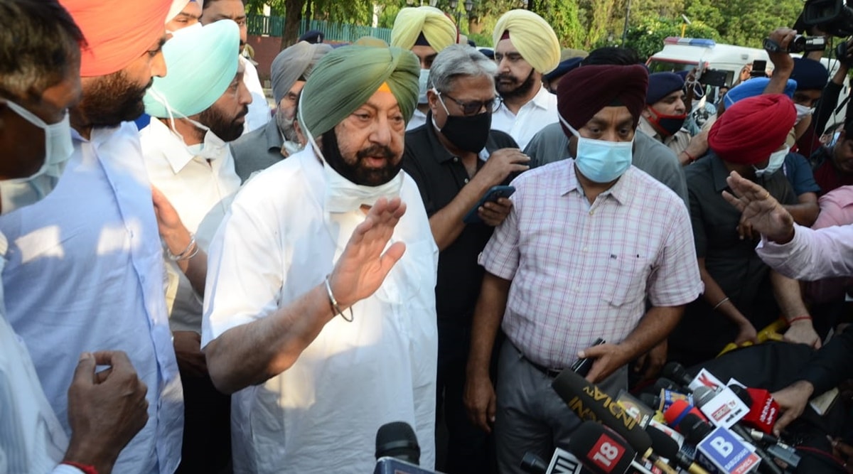 On street, Captain Amarinder Singh looks down from posters but his is an absence amid talk of many crises | India News,The Indian Express