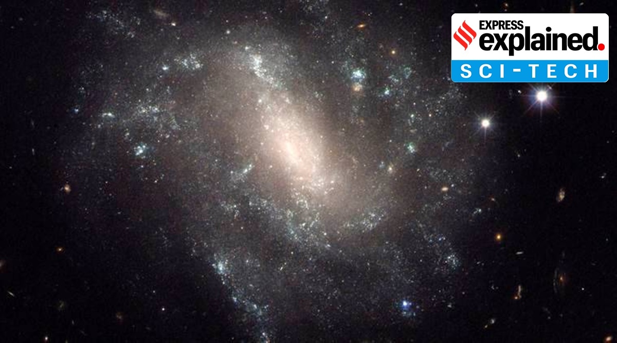 While dark matter attracts and holds galaxies together, dark energy repels and causes the expansion of our universe.