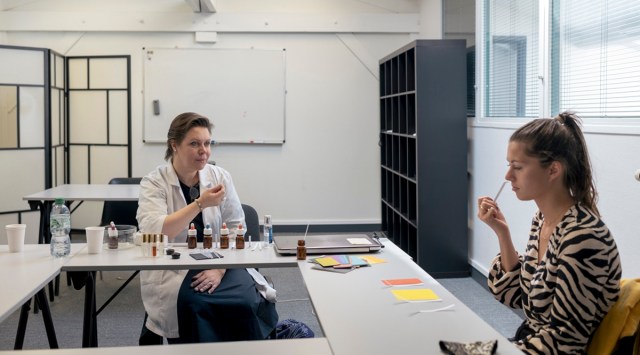 Louane Cousseau, right, works with Olga Alexandre, a neuropsychiatrist who has been working with patients who have lost their sense of smell, in Paris, May 21, 2021. (Dmitry Kostyukov/The New York Times)