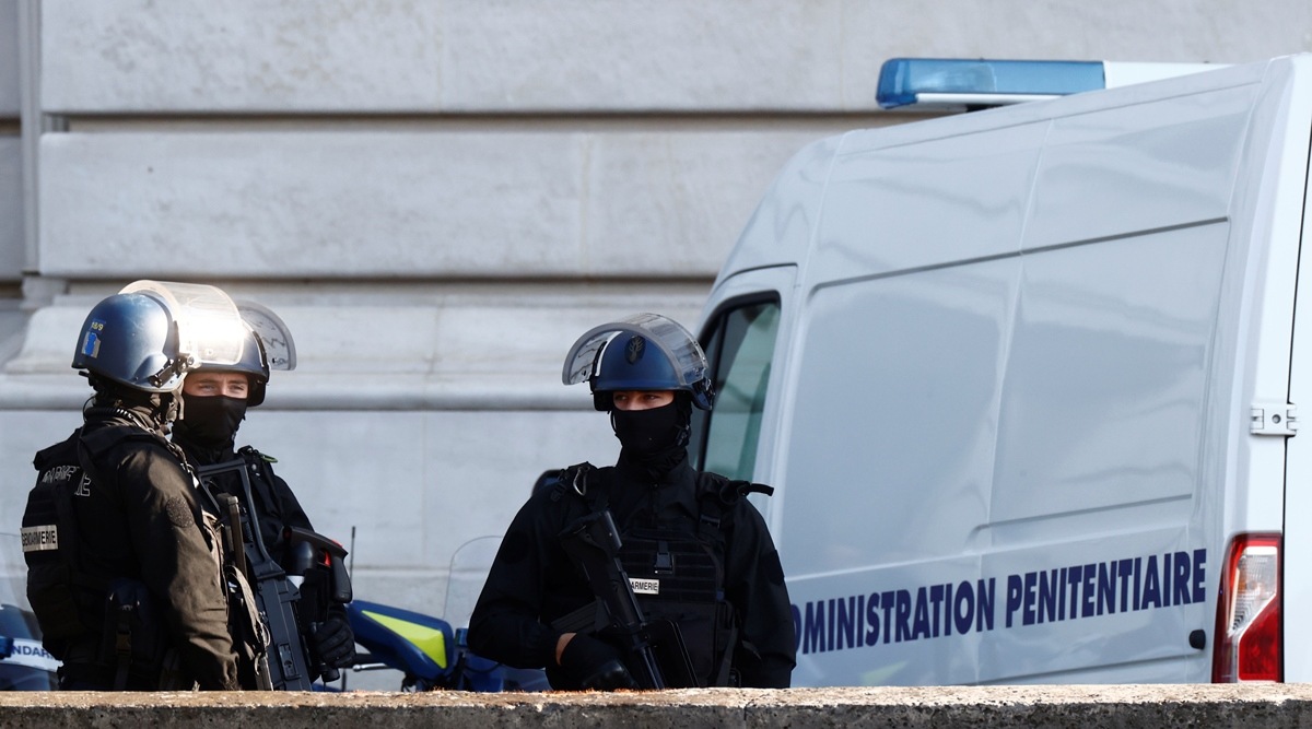 French Gendarmes secure near the Paris courthouse on the Ile de la Cite France during the arrival of a convoy believed to be carrying the defendants who stand trial over Paris' November 2015 attacks, in Paris, France, September 8, 2021. (Reuters)