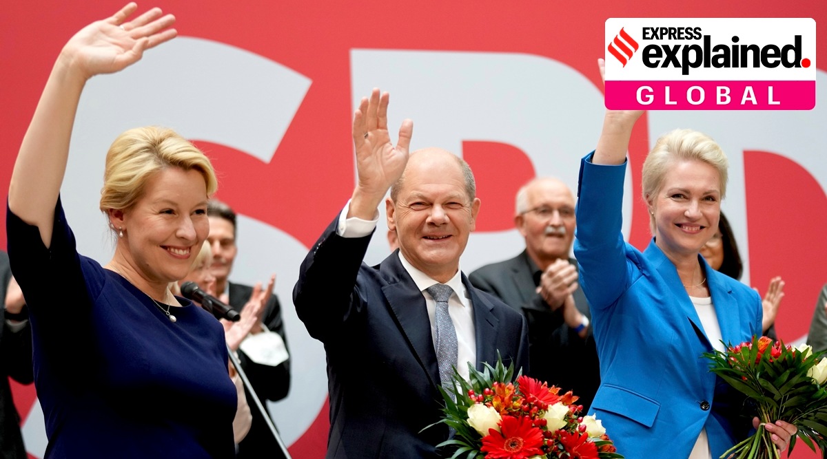 Front from left, Franziska Giffey, top candidate of the SPD for Mayor of the German city of Berlin, Olaf Scholz, top candidate for chancellor of the Social Democratic Party (SPD), and Manuela Schwesig, member of the SPD and governor of the German state of Mecklenburg-Western Pomerania, pose with flowers at the party's headquarter in Berlin, Germany, Monday, Sept. 27, 2021. (AP)