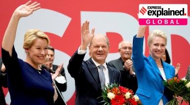 Front from left, Franziska Giffey, top candidate of the SPD for Mayor of the German city of Berlin, Olaf Scholz, top candidate for chancellor of the Social Democratic Party (SPD), and Manuela Schwesig, member of the SPD and governor of the German state of Mecklenburg-Western Pomerania, pose with flowers at the party's headquarter in Berlin, Germany, Monday, Sept. 27, 2021. (AP)