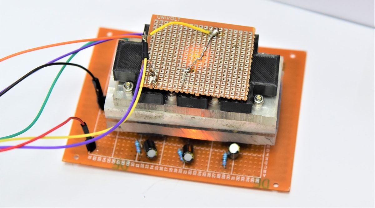 The device uses a combination of Light Emitting Diode (LED) and photodiode sensor to track bacterial growth.