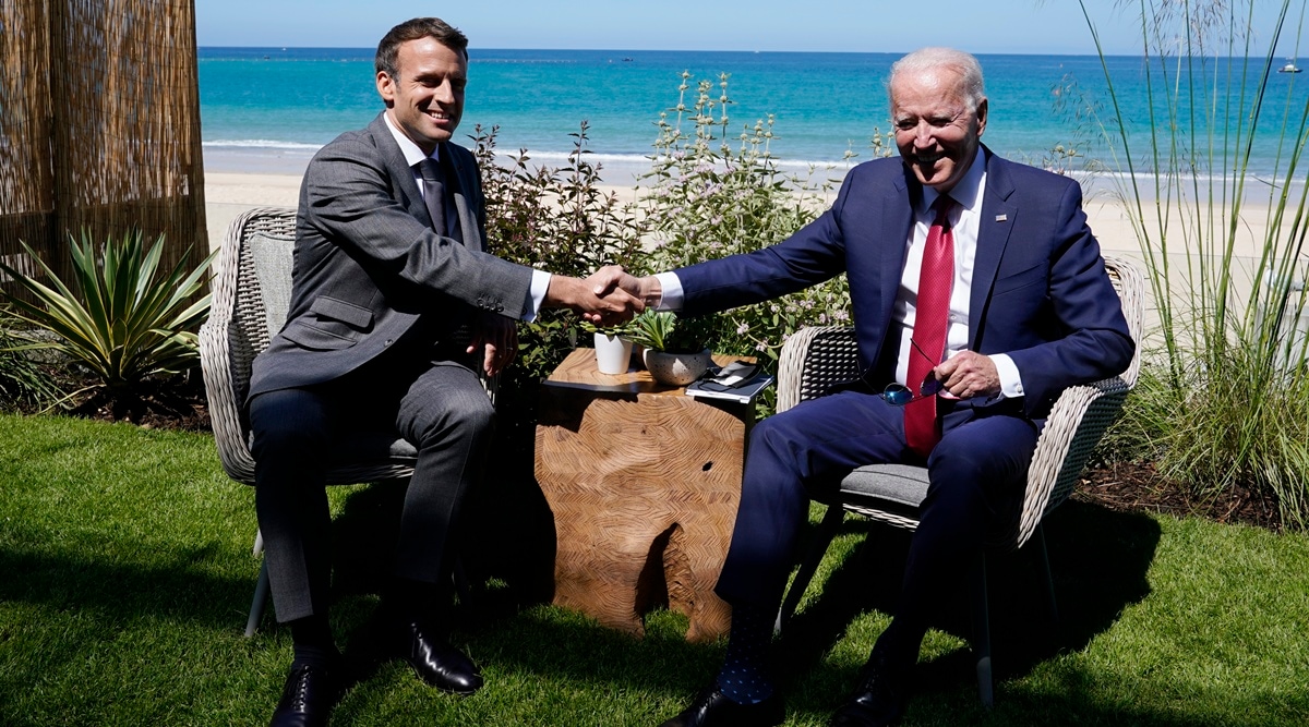 In this June 12, 2021 file photo, President Joe Biden and French President Emmanuel Macron shake hands during a bilateral meeting at the G-7 summit, in Carbis Bay, England. (AP/File)
