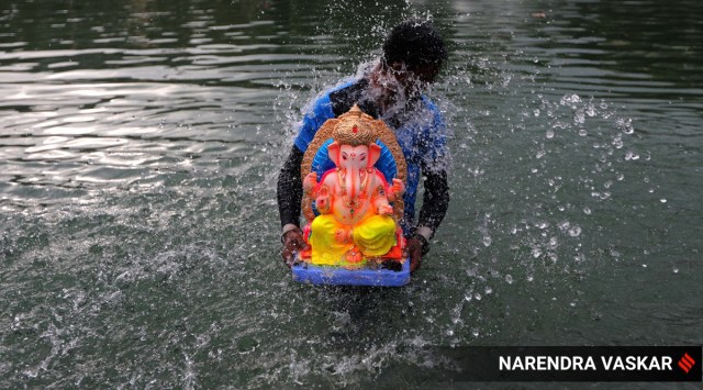 Ganesh idol being immersed in Navi Mumbai on Tuesday. (Express Photo/Narendra Vaskar)