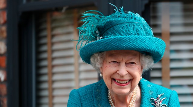 In this Thursday July 8, 2021 file photo, Britain's Queen Elizabeth visits the set of the long running television series Coronation Street, in Manchester, England. (AP)