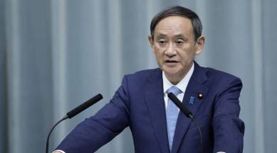 Japan news, Japan PM, Yoshihide Suga, Japan vaccine minister, world news, Indian express