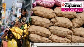 FILE PHOTO: Labourers load food items into a delivery lorry near a main market in Colombo Sri Lanka, Sri Lanka emergency, Sri Lanka food emergency, Sri Lanka debt, Sri Lanka news, Indian Express
