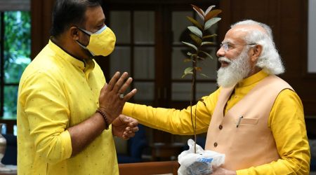Actor-turned-BJP MP, Suresh Gopi shared the photo of Modi accepting the gift by the aspiring girl farmer in his Twitter and Facebook handles on Thursday with a brief note. (Twitter/@TheSureshGopi)
