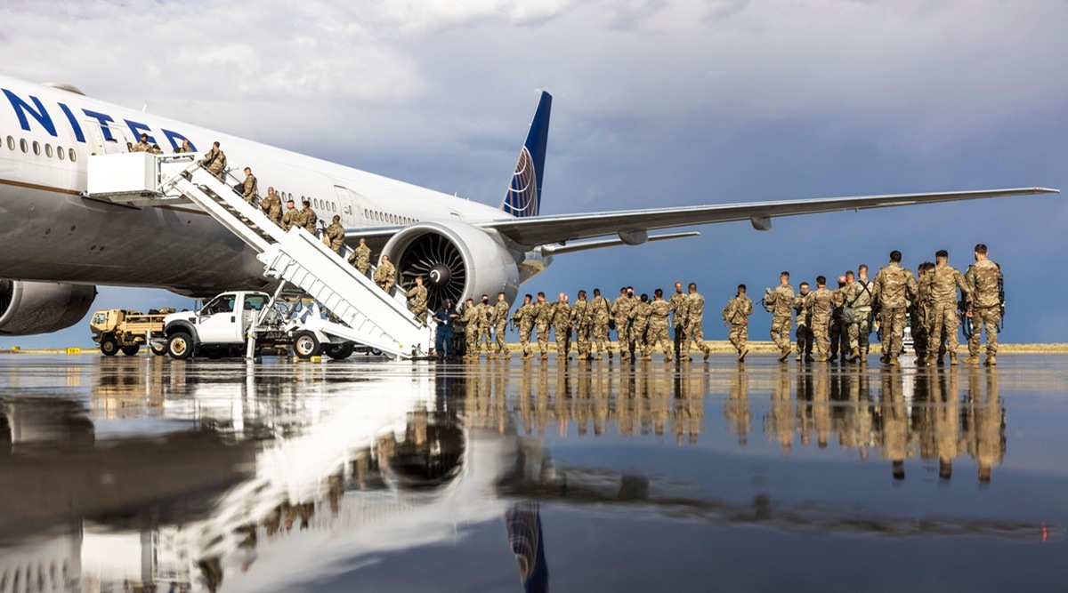 Soldiers with the First Stryker Brigade Combat Team, Fourth Infantry Division, board a flight to start their nine month deployment to Iraq, at Fort Carson in Colorado Springs, Colo., Sept. 12, 2021. (Michael Ciaglo/The New York Times)