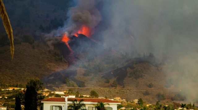 Lava flows from an eruption of a volcano at the island of La Palma in the Canaries, Spain, Sunday. (AP Photo/Jonathan Rodriguez)