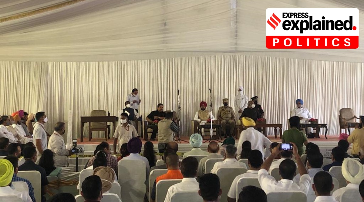 Governor, CM and Deputy CMs on stage during the oath taking ceremony at Punjab Raj Bhawan