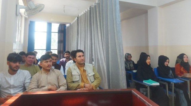 Students attend class under new classroom conditions at Avicenna University in Kabul, Afghanistan on Sept. 6, 2021, in this picture obtained by Reuter from social media.
