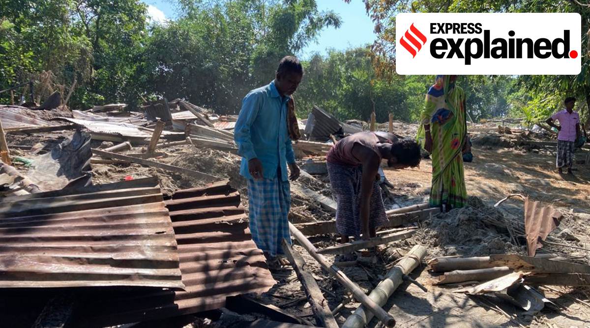 Evicted villagers inspect  the remains of their homes in Dholpur. (Express photo by Sadiq Naqvi)