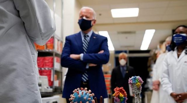 In this Feb. 11, 2021 file photo, President Joe Biden visits the Viral Pathogenesis Laboratory at the National Institutes of Health (NIH) in Bethesda, Md. (AP)