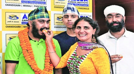 JEE national topper Guramrit Singh with his family in Chandigarh on Wednesday. Express photo