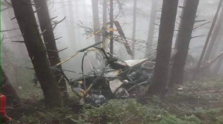 Mangled remains of the helicopter. 
