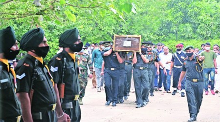 Army jawans carry the the coffin containing the mortal remains of pilot Anuj Rajput at Sector 20 cremation ground in Panchkula on Wednesday.  (Photo: Jaipal Singh)